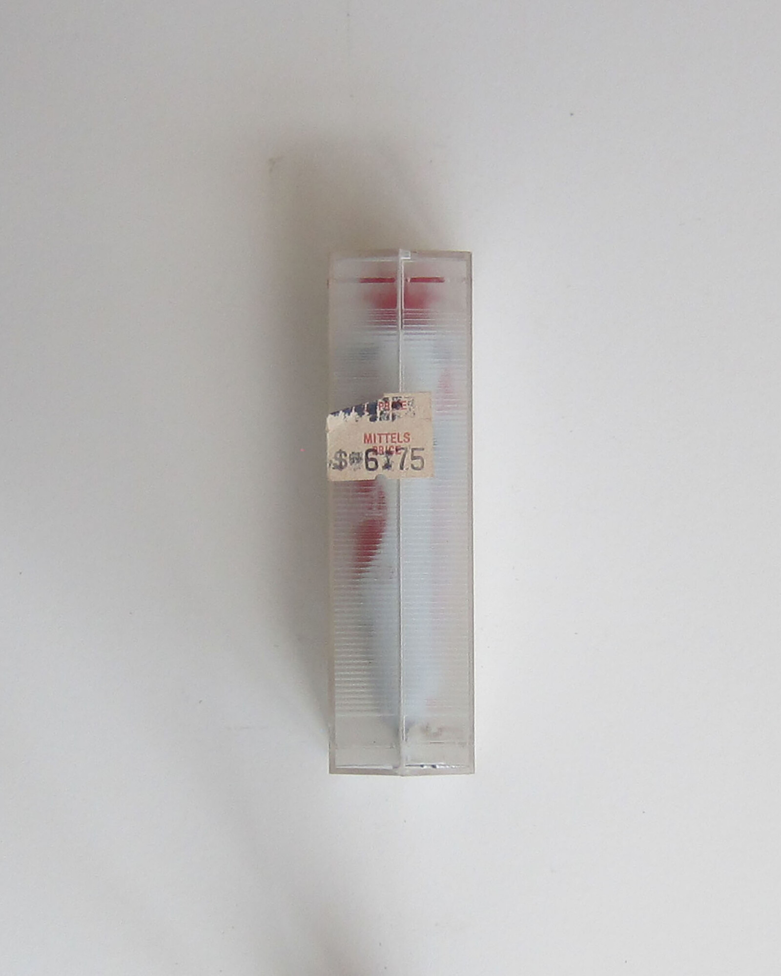 Studio Materials, Unopened clear plastic box with tube of Grumbacher Oil Color in the shade "Cadmium Red, Medium" inside.